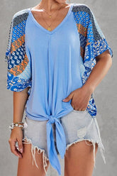 Camiseta holgada de gasa con costuras y mangas acampanadas